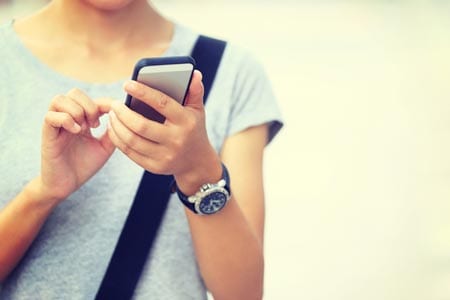 display advertisting: woman looking at her phone