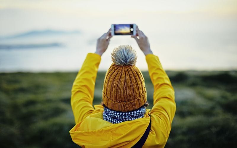 woman in ireland taking photos