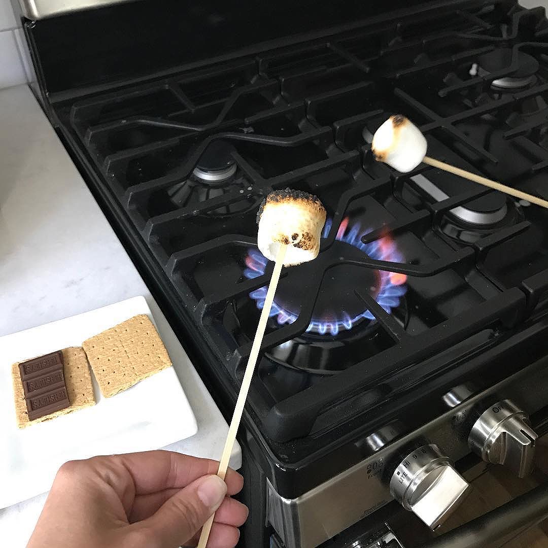 Sometimes you need to celebrate a new stove with a s'more #smores #kitchenremodel #mainehomedesign #newappliancesmakemehappy #maine #homeremodel #portlandmaine #bluebungalowproject #heartenhome